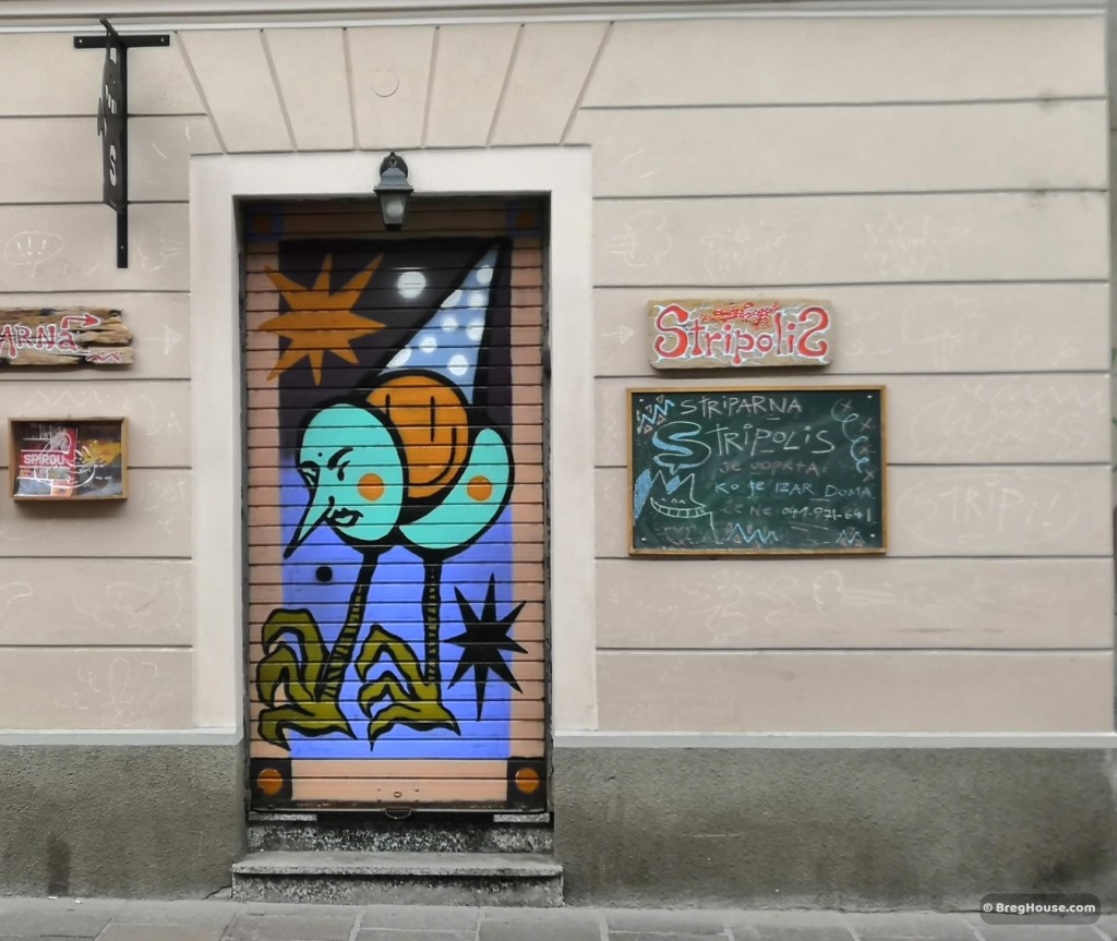 Painted door to comic shop in Ljubljana, Slovenia