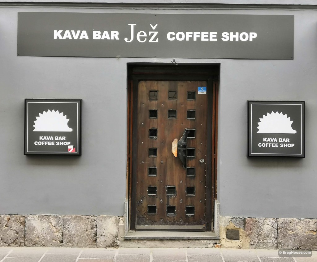 door of Kava bar Jez coffee shop in Ljubljana, Slovenia
