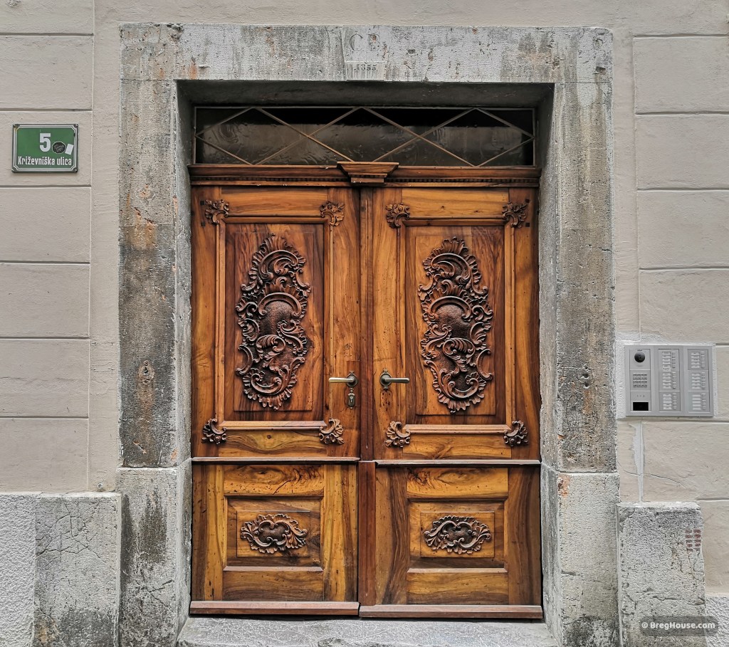 Magnficient, carved, double wooden door in Ljubljana, Slovenia