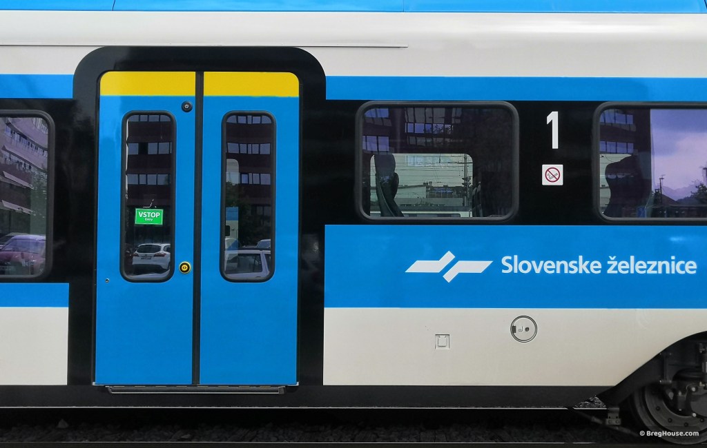 Blue and yellow train door in Ljubljana, Slovenia