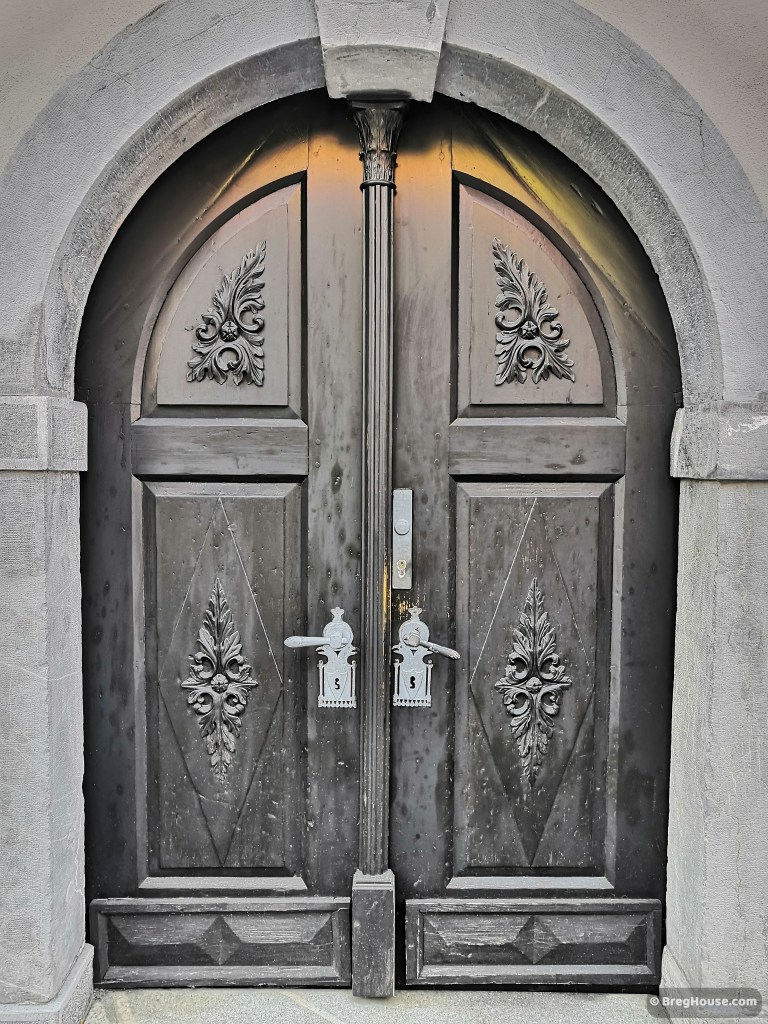 Wooden, carved door in Ljubljana, Slovenia